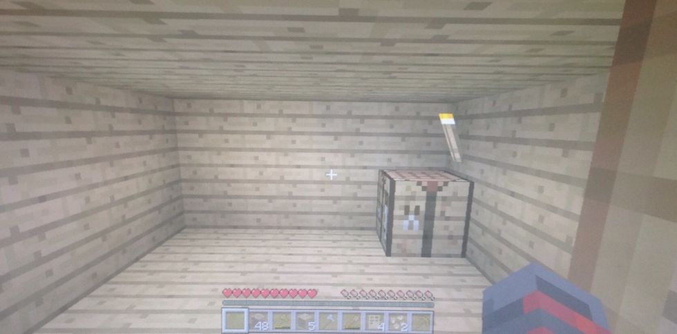 Add a couple of torches so no monsters spawn in the house.