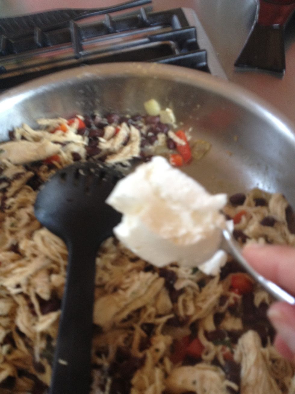 Add a couple scoops of sour cream, stir and let simmer