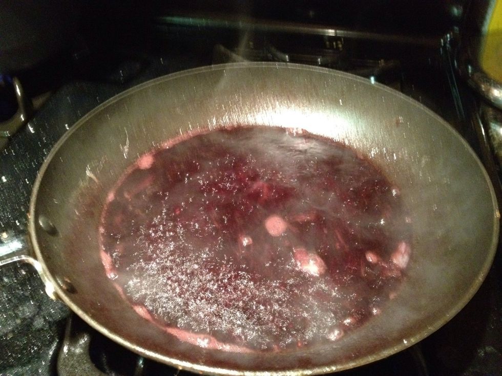 Add a cup of red wine to the pan (yes more wine!) and cook it until it's reduced by half.