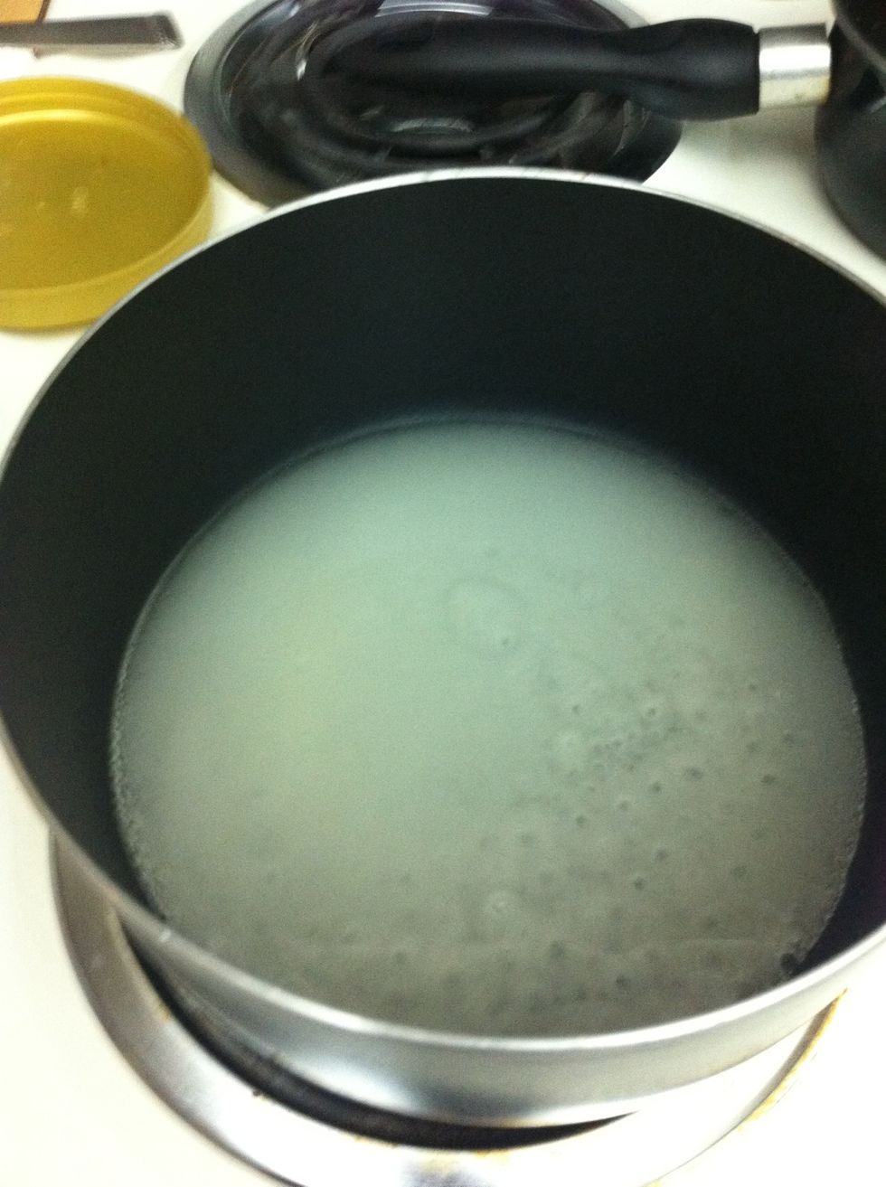 Add a cup of sugar and a tablespoon of water