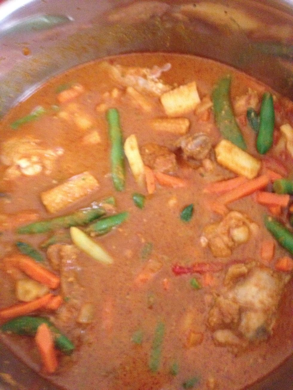Add a cup of water to the curry and let it simmer in low heat for 30 minutes. Stir occasionally to prevent burning