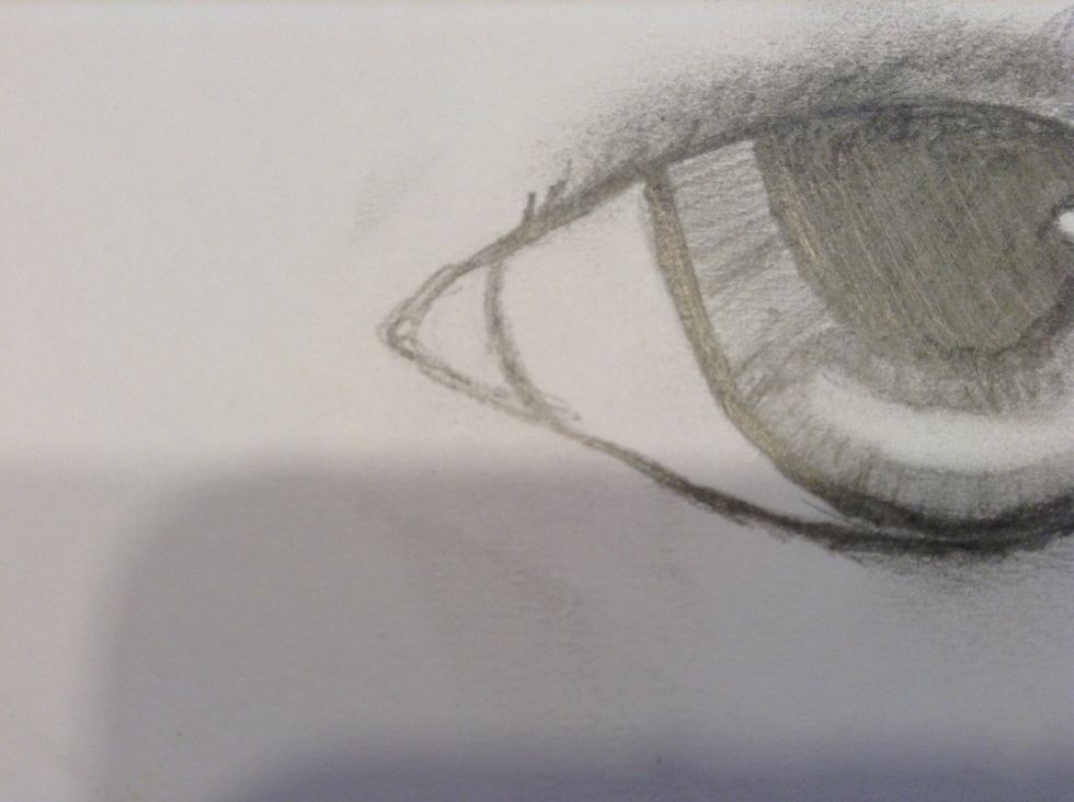 Add a curved line to this area of the eye.