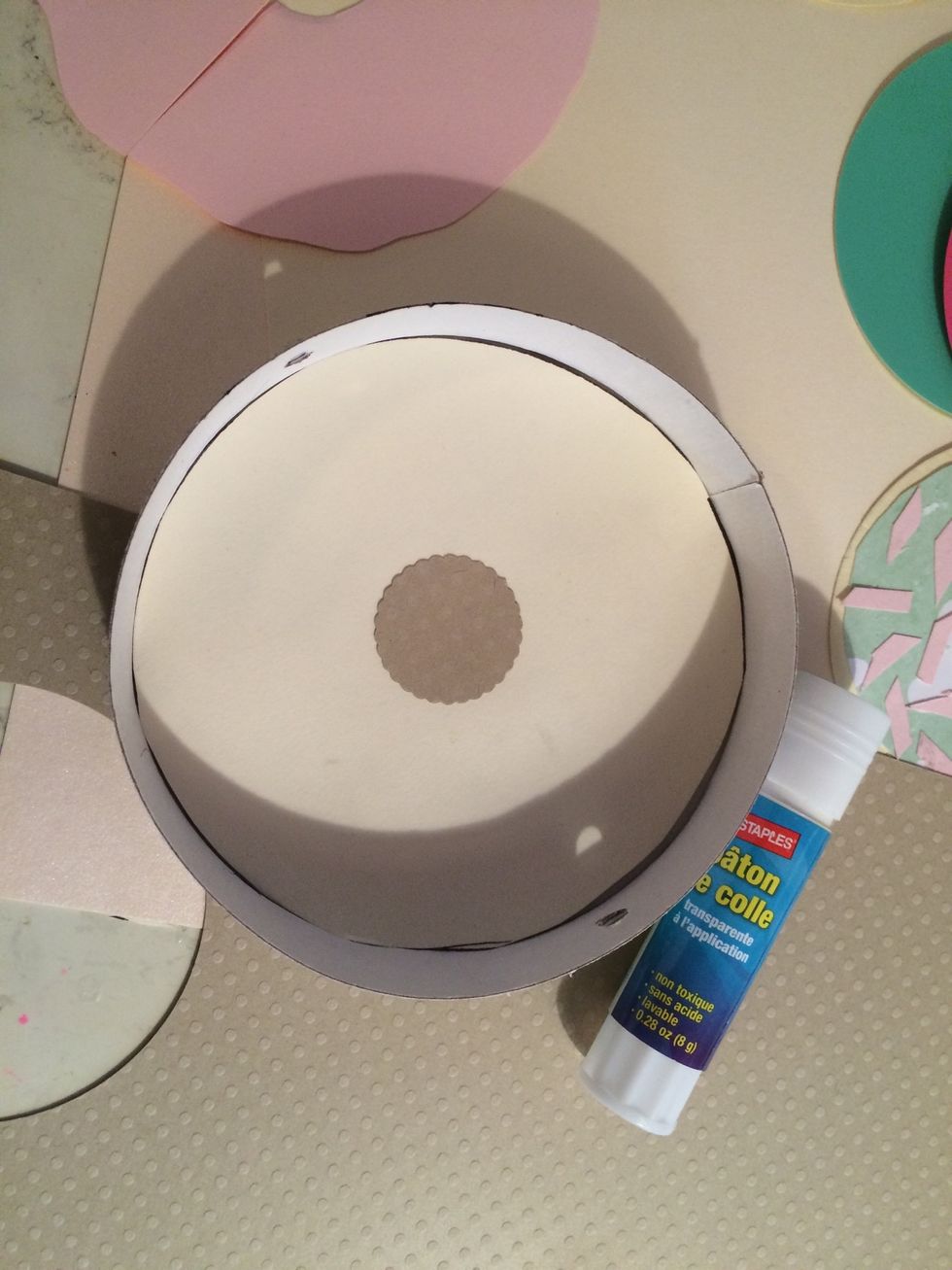 Add a darker brown circle to the middle, to act as the donut hole.