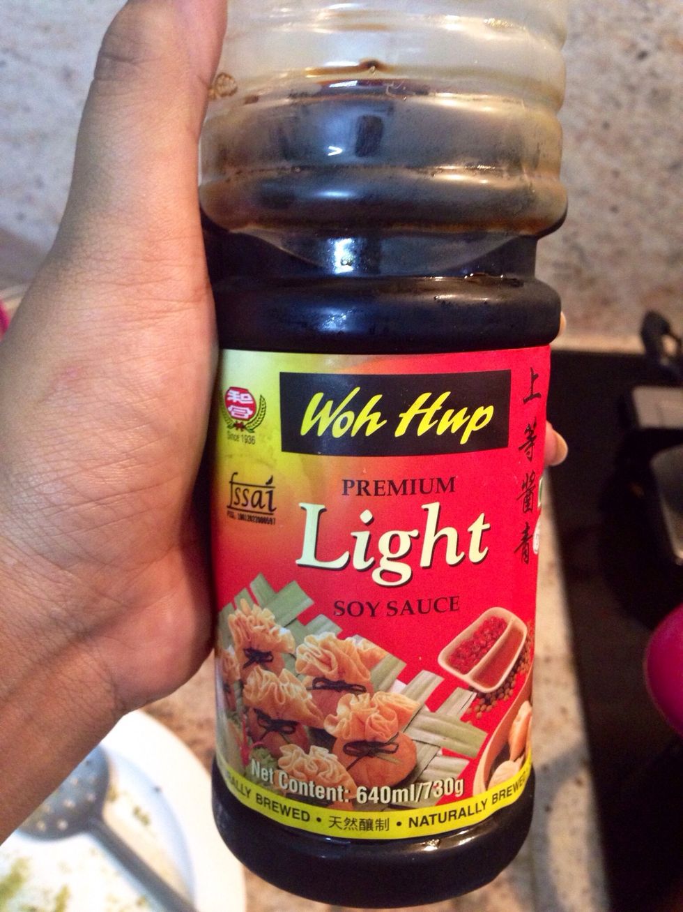 Add a dash of light soy into the wok and let it all mix well.