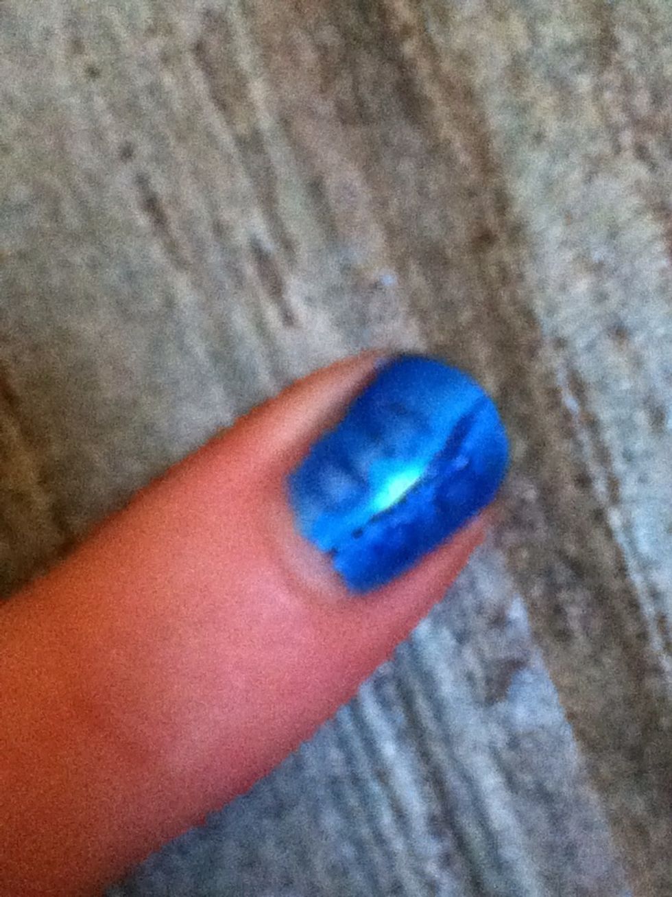 Add a different blue pen in a line. Put as many squares down the sides as you can fit. (I could only fit two, it's my guitar chord hand.)