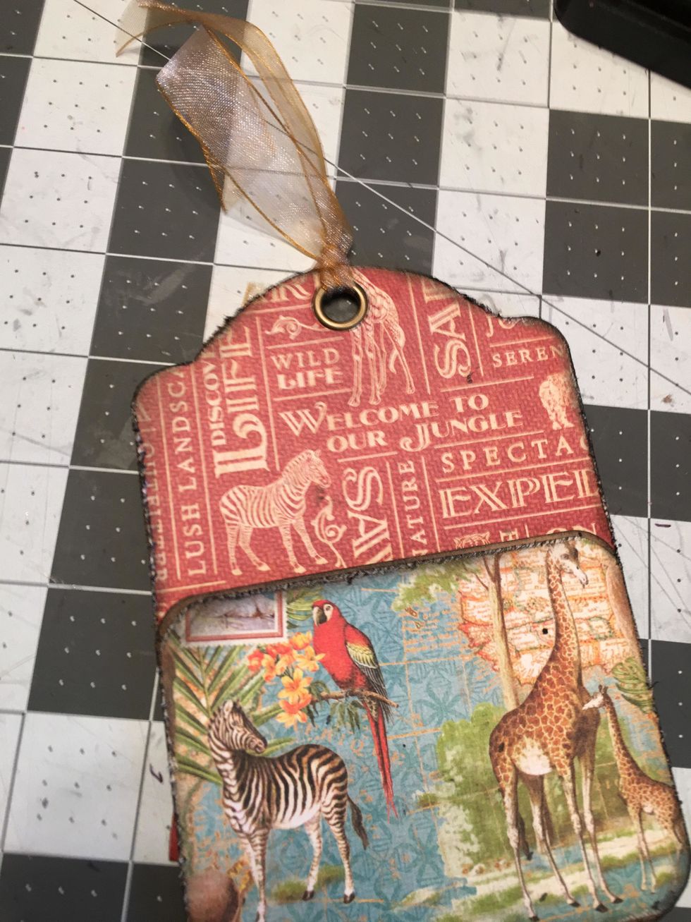 Add a different piece of ribbon to the first pocket tag.
