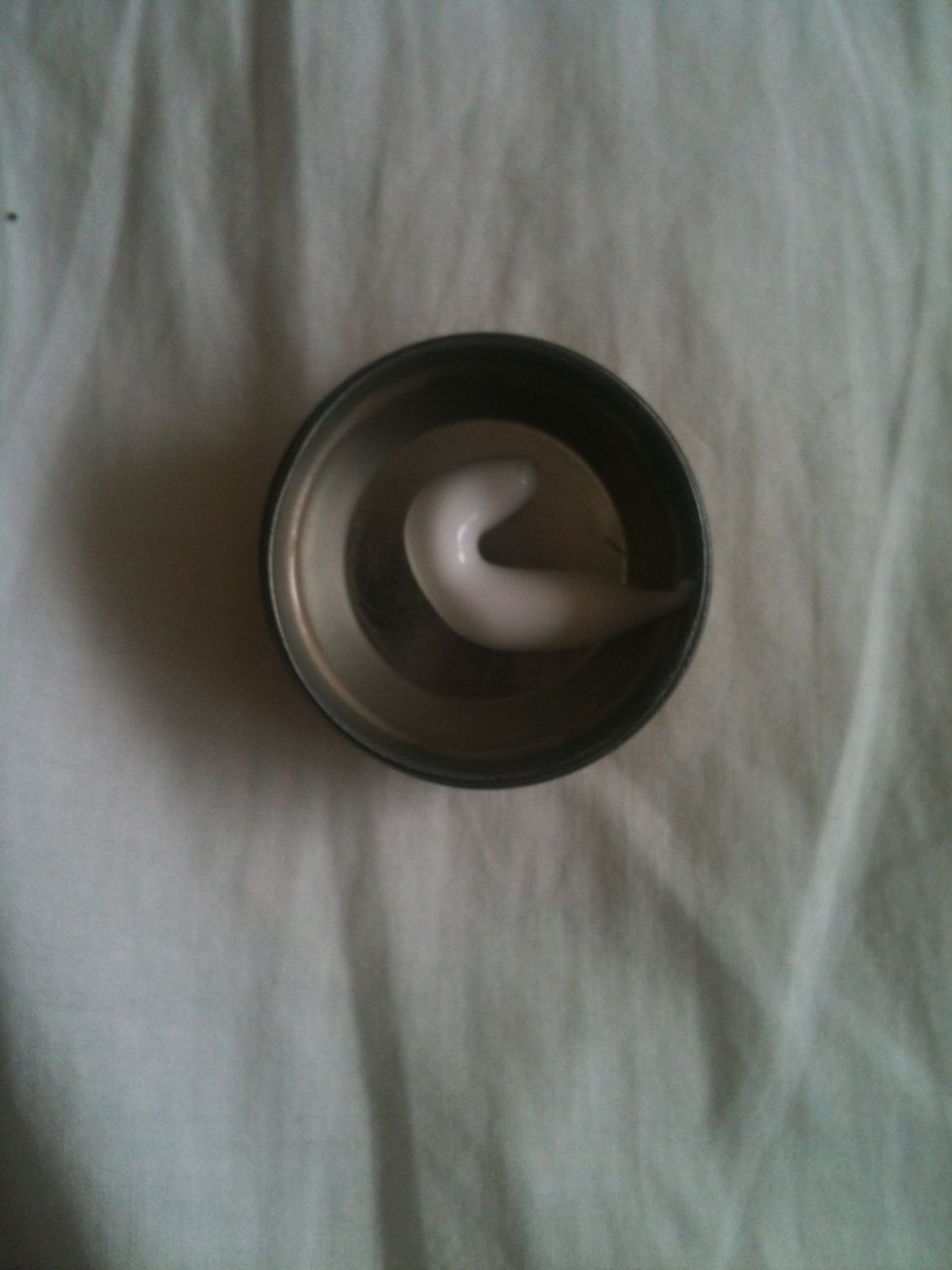 Add a dollop of your moisturizer to the container (I'm using an empty lip balm jar)