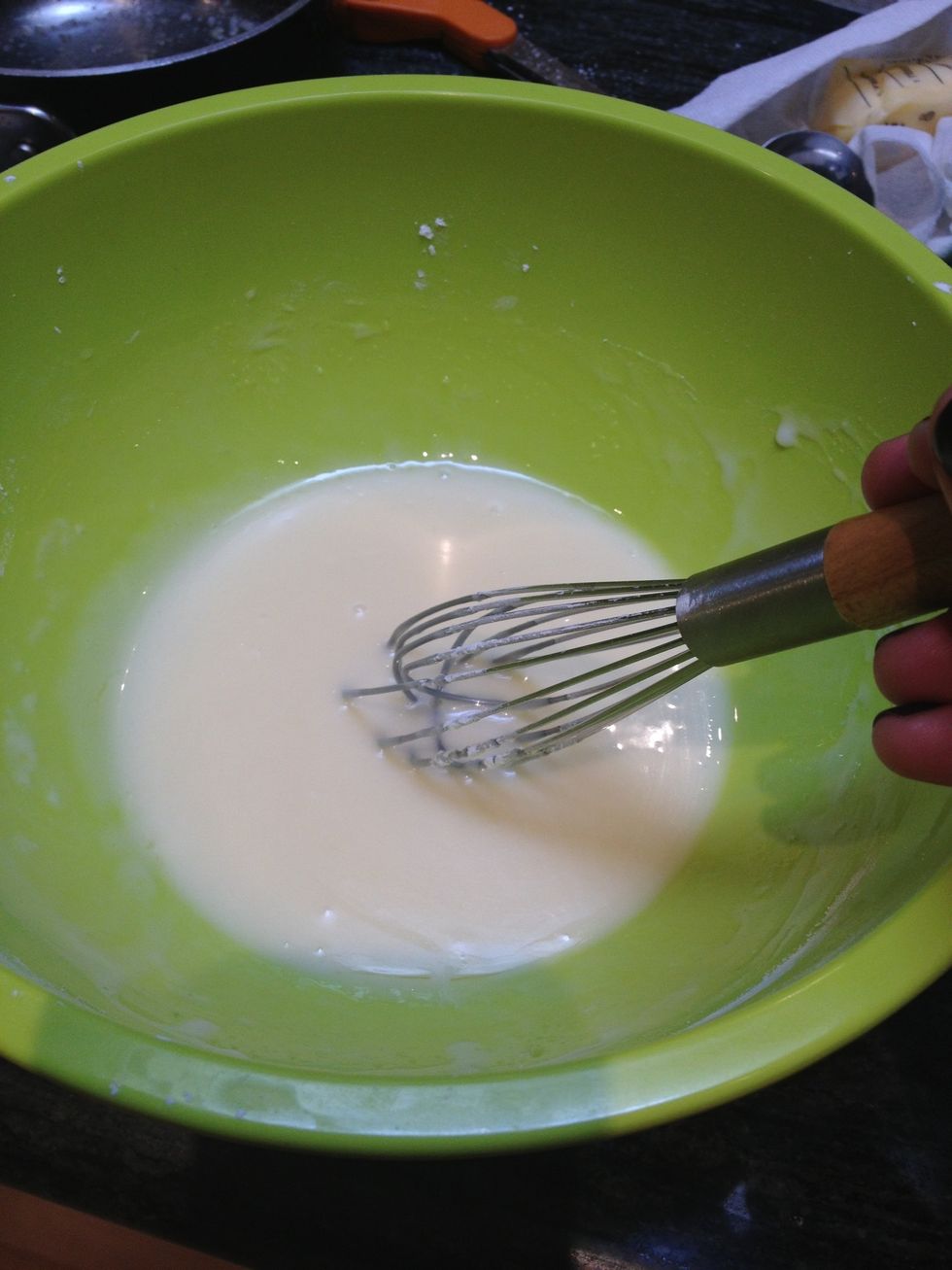 Add a few drops if lemon. Taste the glaze and see if you would prefer a more lemony taste. If so, add more.