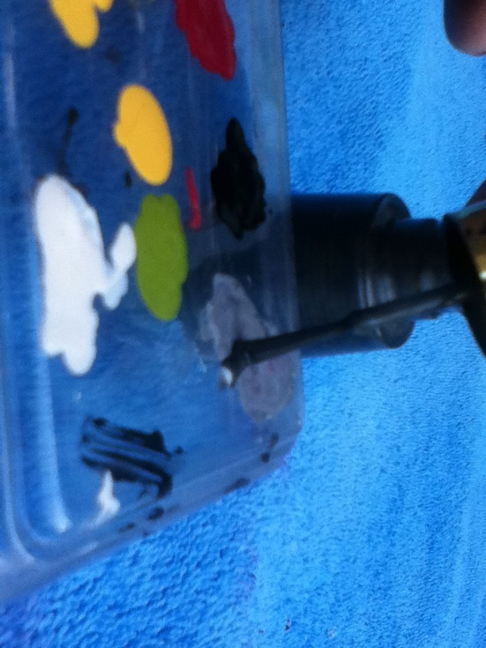 Add a few drops of dark grey polish onto your tray. This step can be skipped if u have a light grey polish.