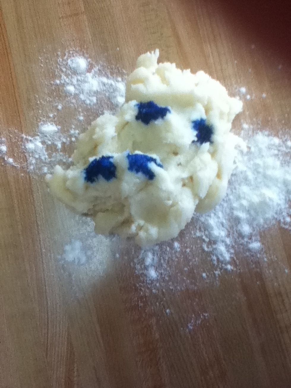 Add a few drops of food coloring to the dough. You will need a lot of color if you want it to be really bright.