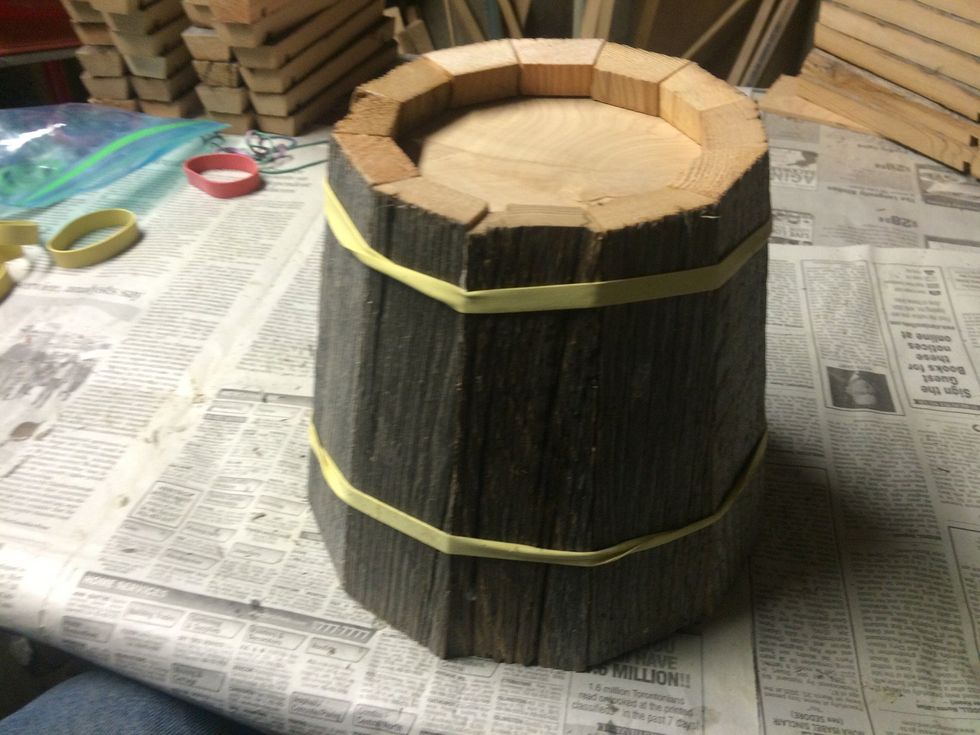 Add a few more rubber bands to insure a tight fit. Adjust any of the staves that are out of whack or not flush with each other.