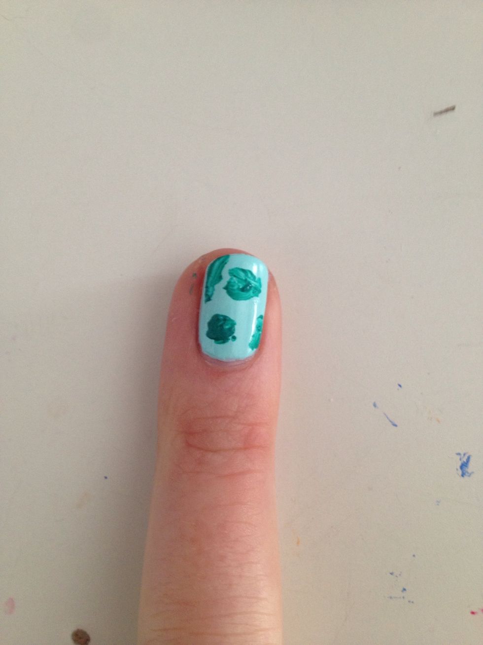 Add a few small blobs of paint onto each nail.