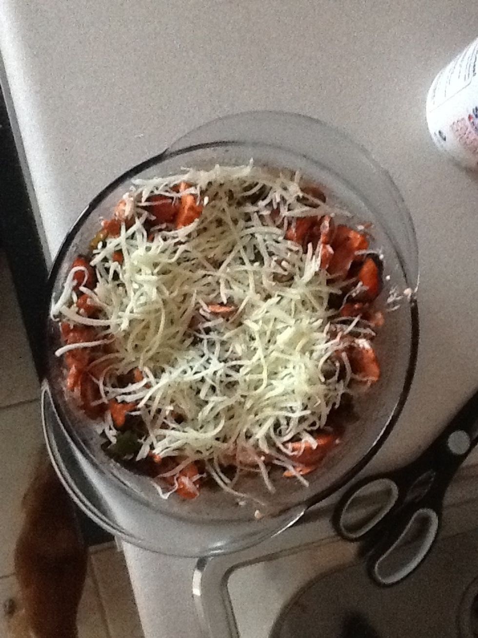 Add a few spoonfuls of cottage cheese (the amount is really up to you). Then sprinkle mozzarella cheese on top. Bake for 35-45 minutes on 400* then enjoy!