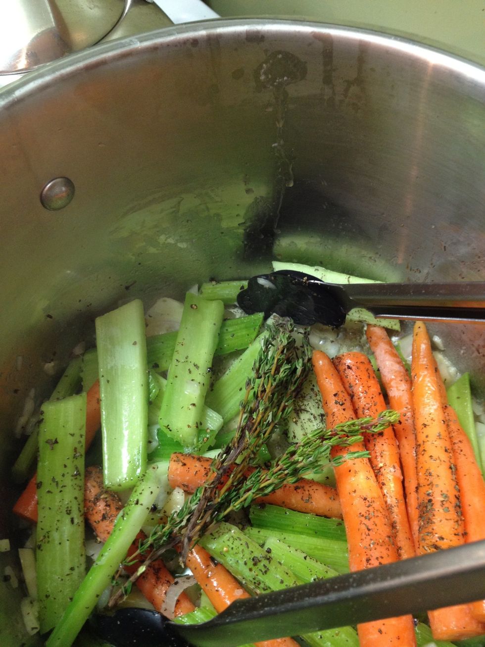 Add a few sprigs of thyme as well. Keep them on the stem for easy removal.