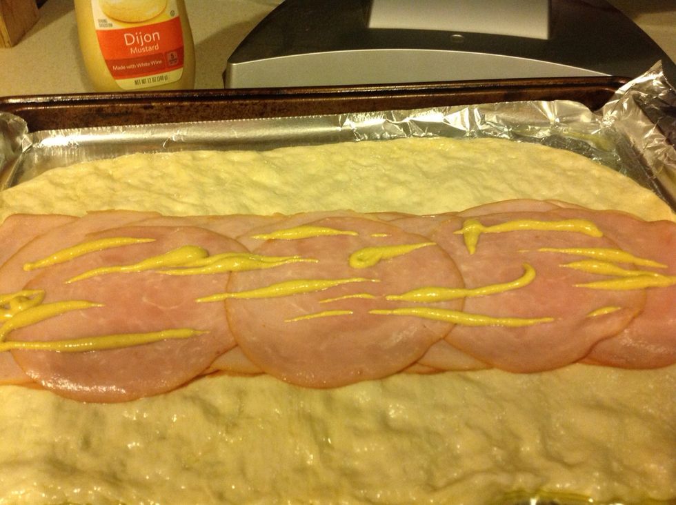 Add a few squirts of mustard, or any condiment that your prefer.