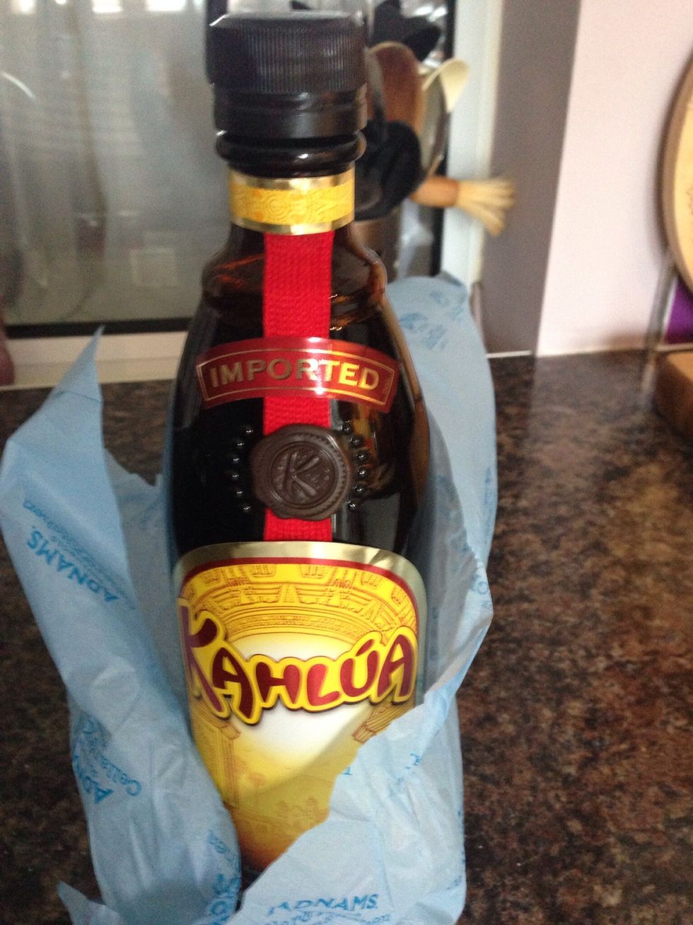 Add a few tablespoons of a coffee liqueur like this Kahlua and stir until sugar is dissolved and coffee is gently simmering (don't allow to boil)