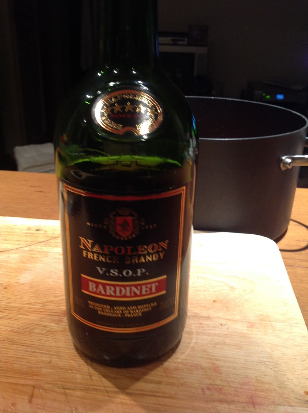 Add a generous amount of Brandy (about a quarter of a 700ml bottle) - bottom shelf stuff will do fine. Can use Black Rum or something similar as an alternative.