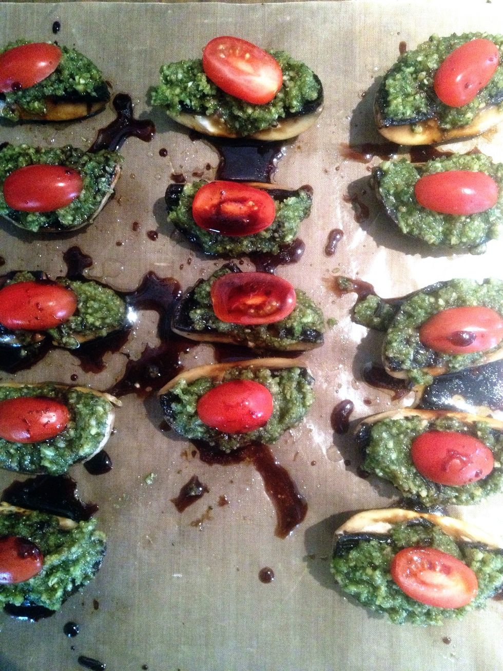 Add a generous amount of pesto to cover each mushroom cap. I've place a sliced baby tomato on top just to add a little colour to the dish!