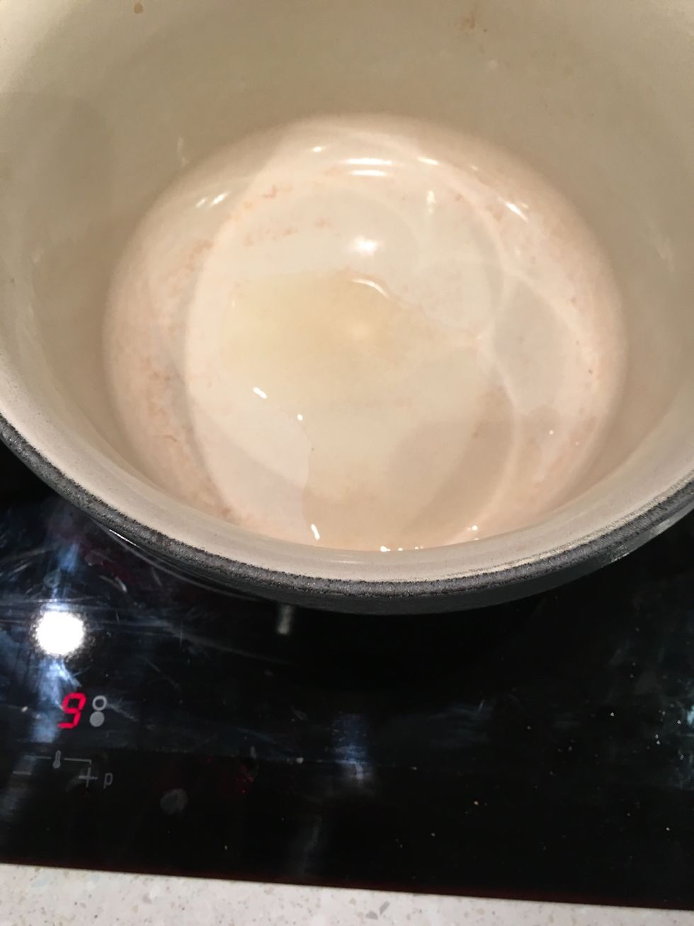 Add a glug of vegetable oil to a heavy base pot. Knock up the heat to bring it to the right temp, then back to medium