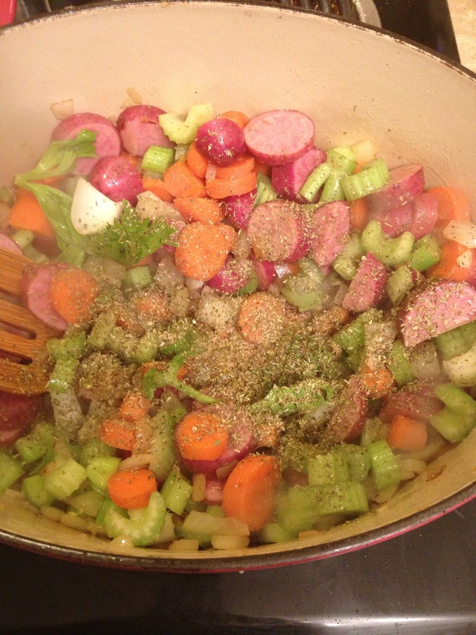 Add a good dash of Italian seasoning (or herbs de province if you have it). Continue to saut\u00e9 for a couple of minutes.