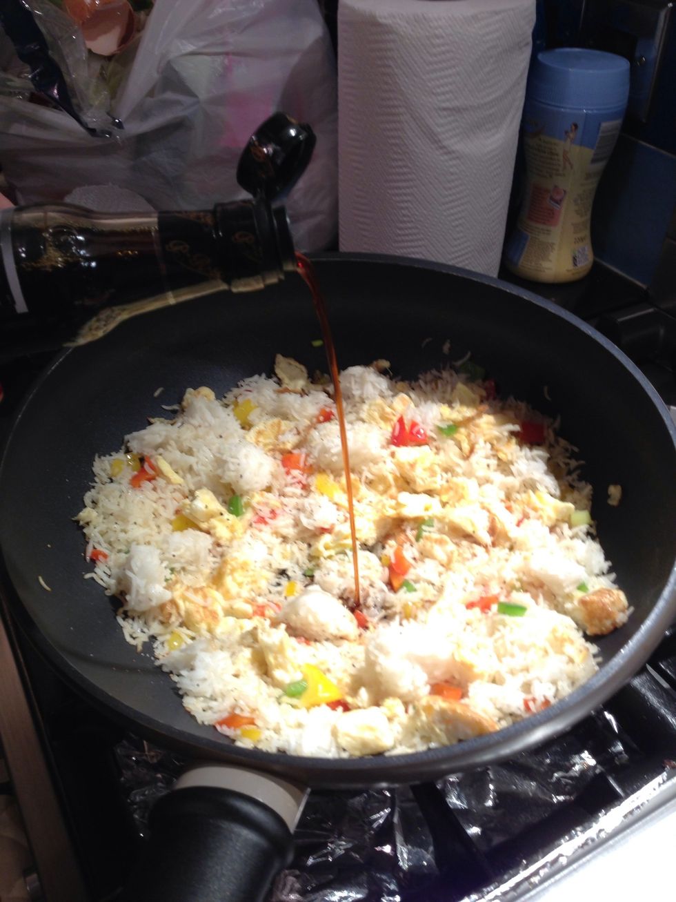 Add a good glug of the light soy sauce.