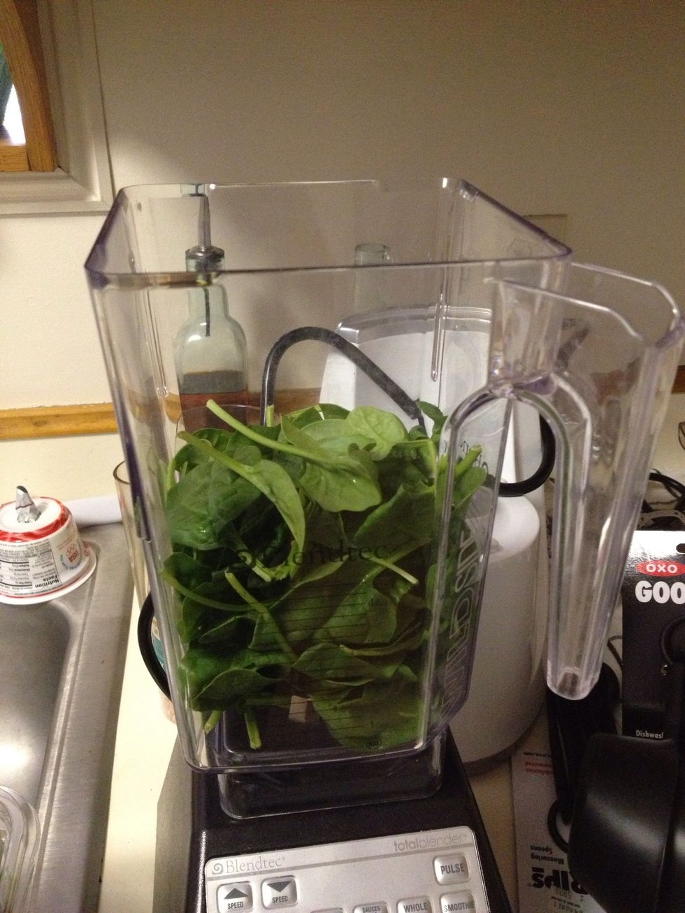 Add a good whopping amount of greens to your blender jar. The amount will reduce with blending so be generous.