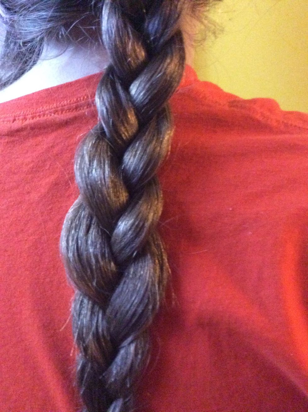 Add a hair tie to secure the braid