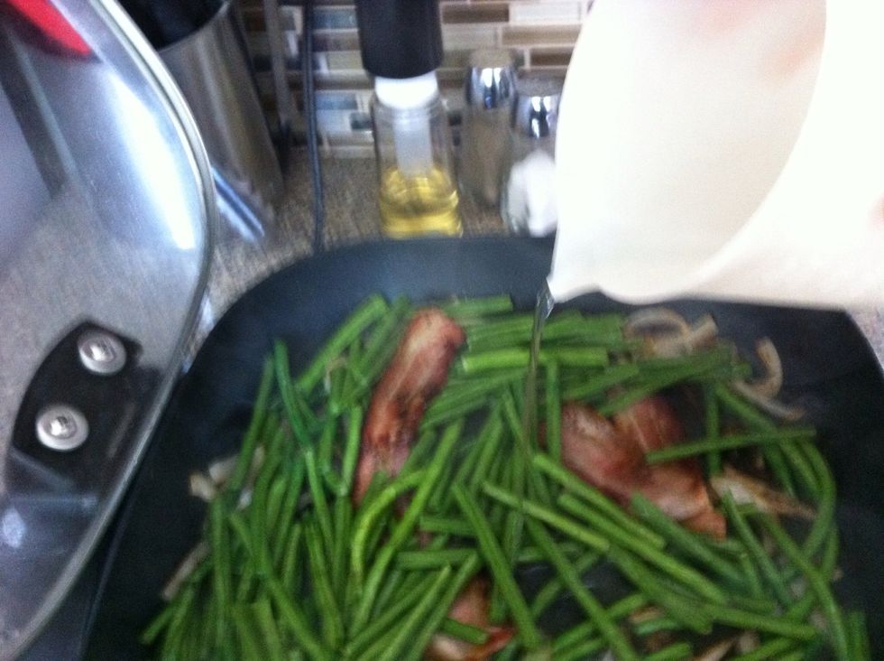 Add a half cup if water to the skillet.