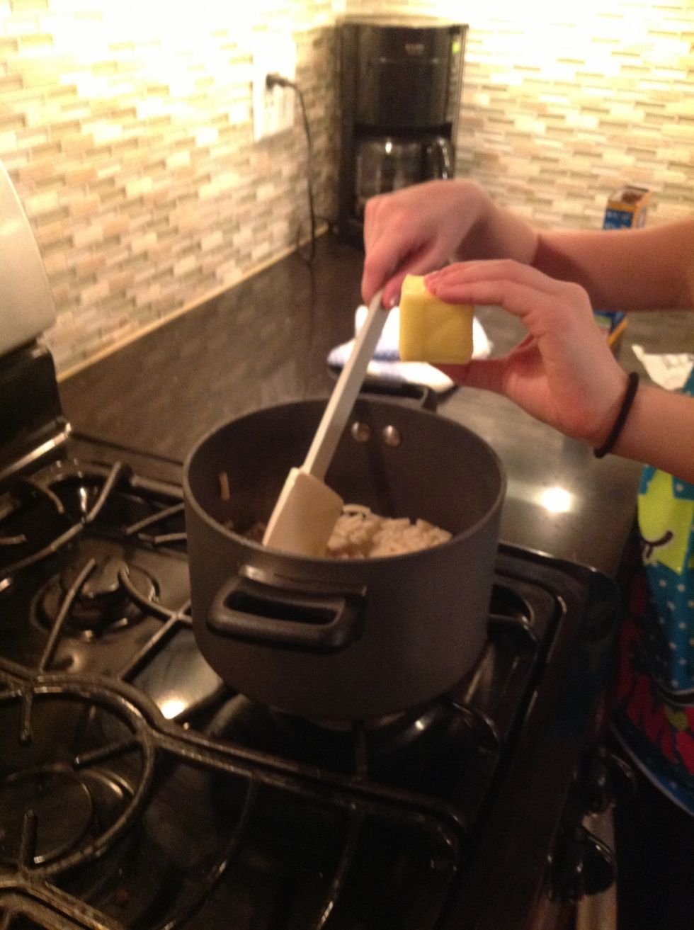 Add a half of a cube of butter into the pan.