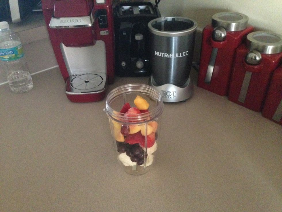 Add a half of a cup of mixed fruit. I use frozen fruit because it makes the smoothie cold and the fruit never goes bad :)