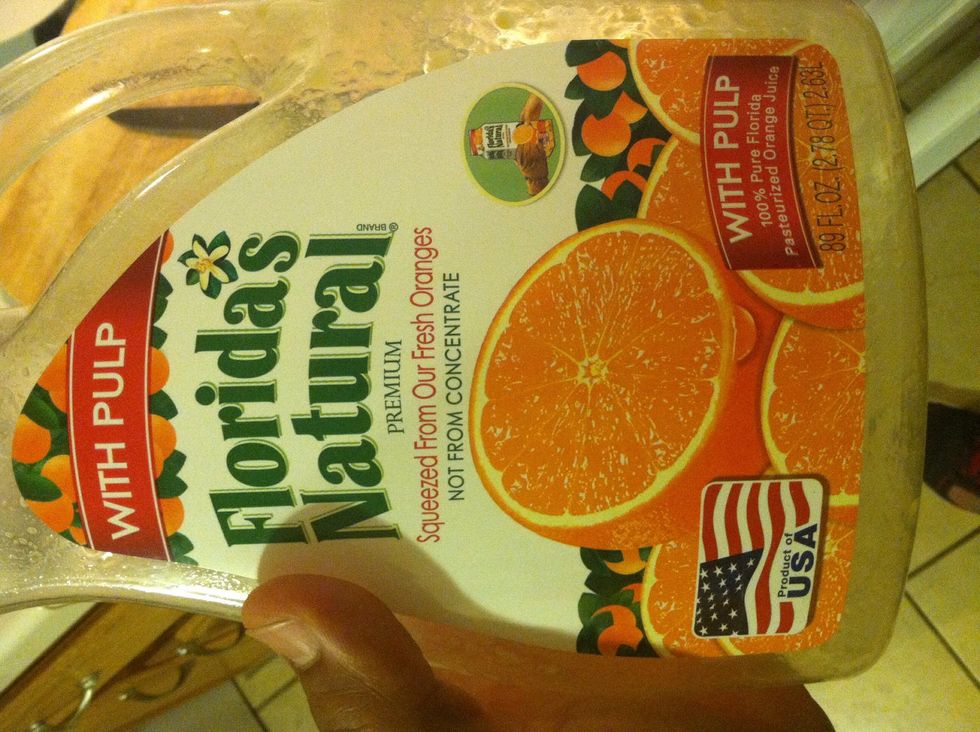 Add a half of cup of orange juice to the chicken..