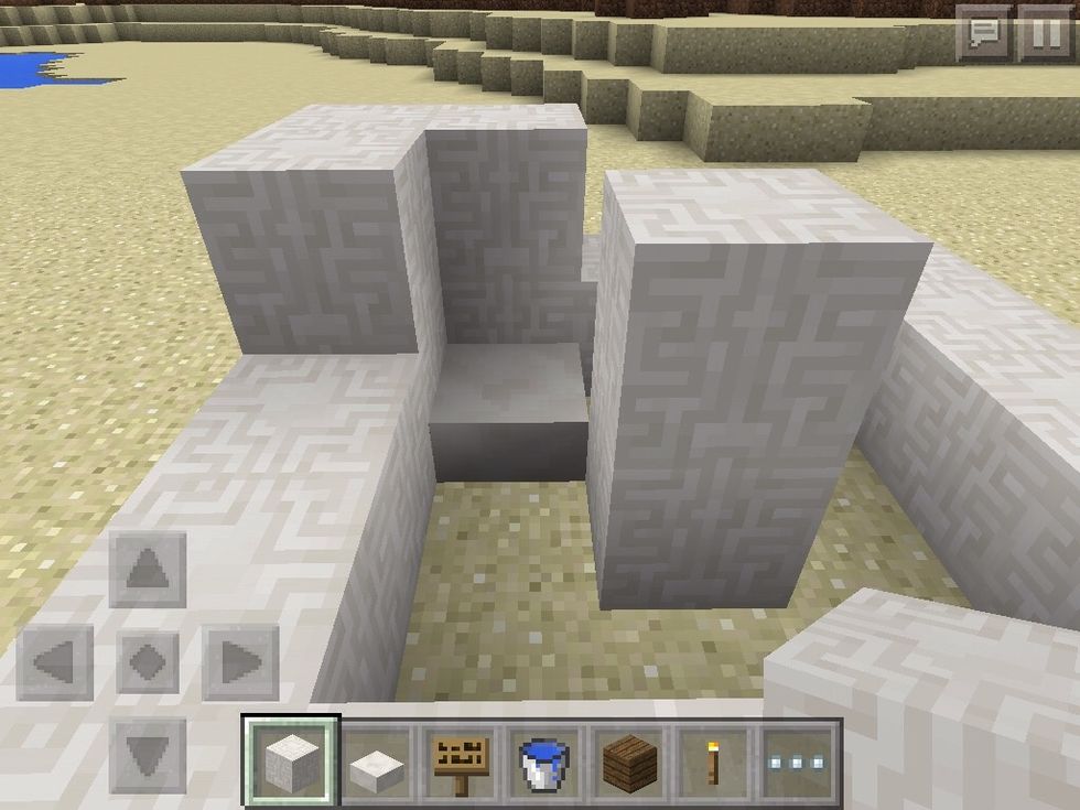 Add a half slab to the ground and some blocks to the corner