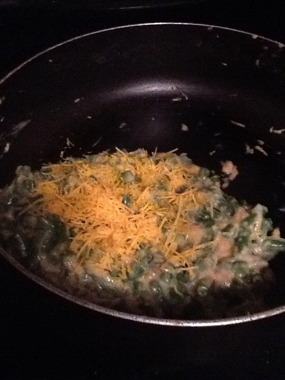 Add a handful of cheddar cheese