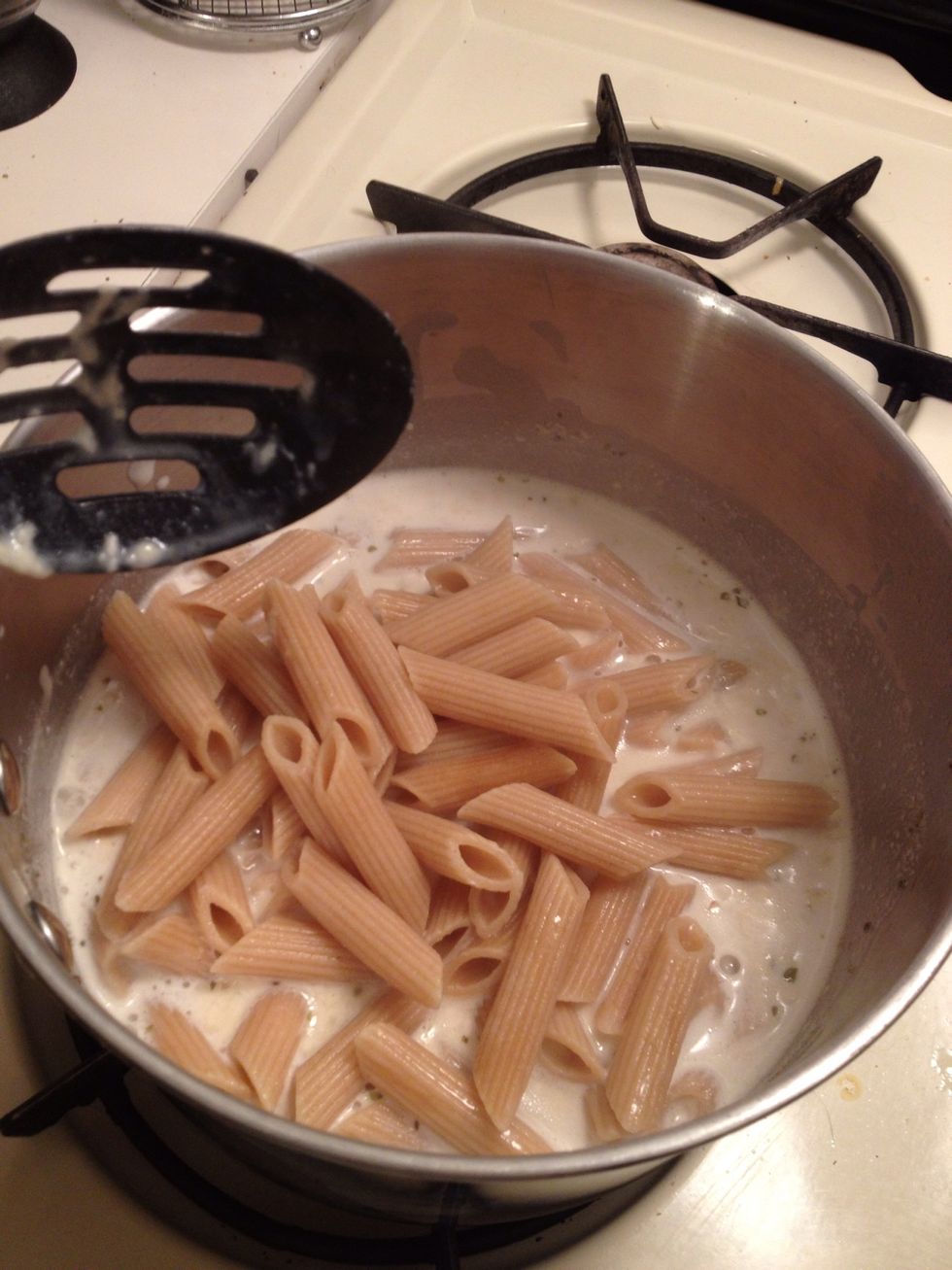 Add a handful of cheeze and the pasta to the sauce...