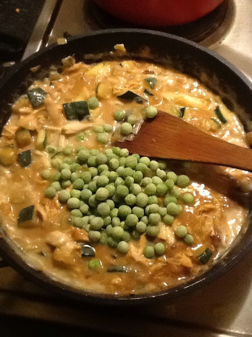 Add a large handful of frozen peas