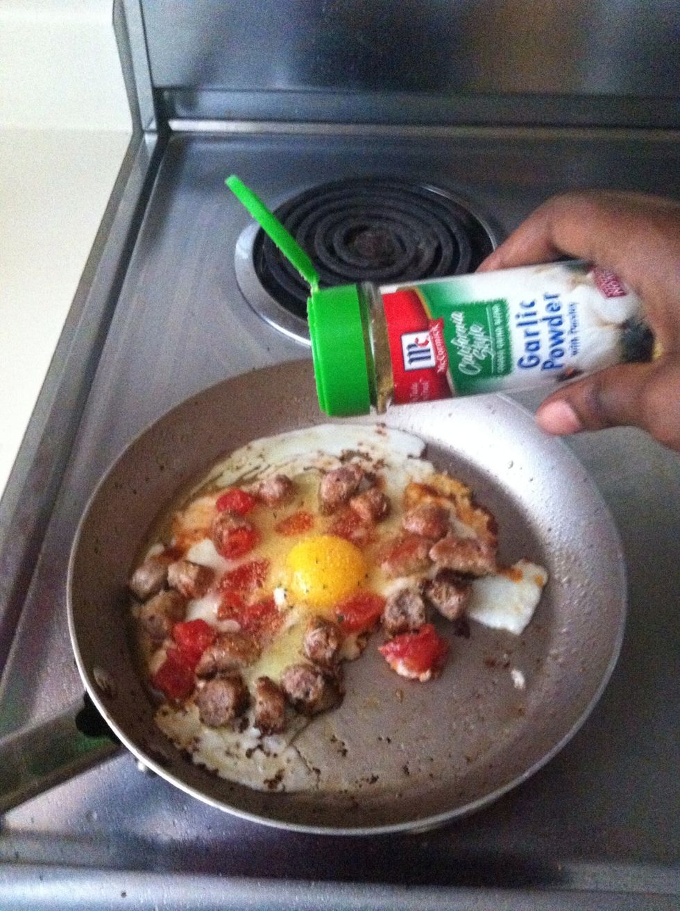 Add a last dash of garlic powder and cook eggs to your convenience.