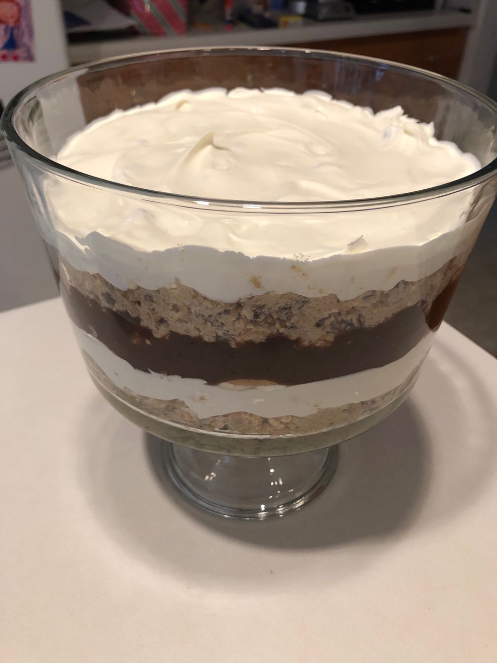 Add a layer of cookie dough, then add a layer of whipped cream.