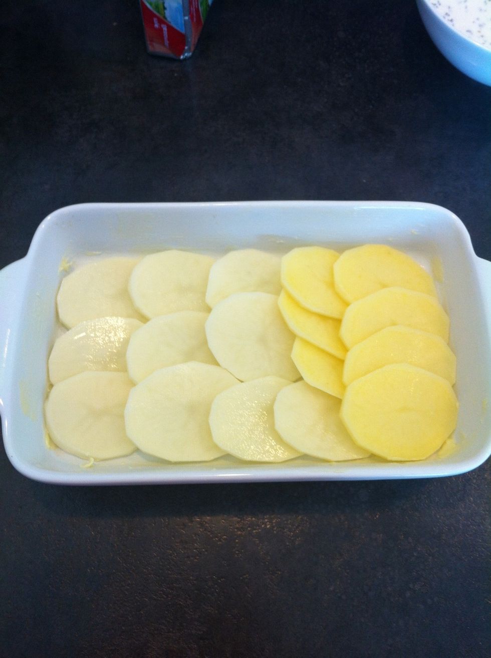Add a layer of potatoes.