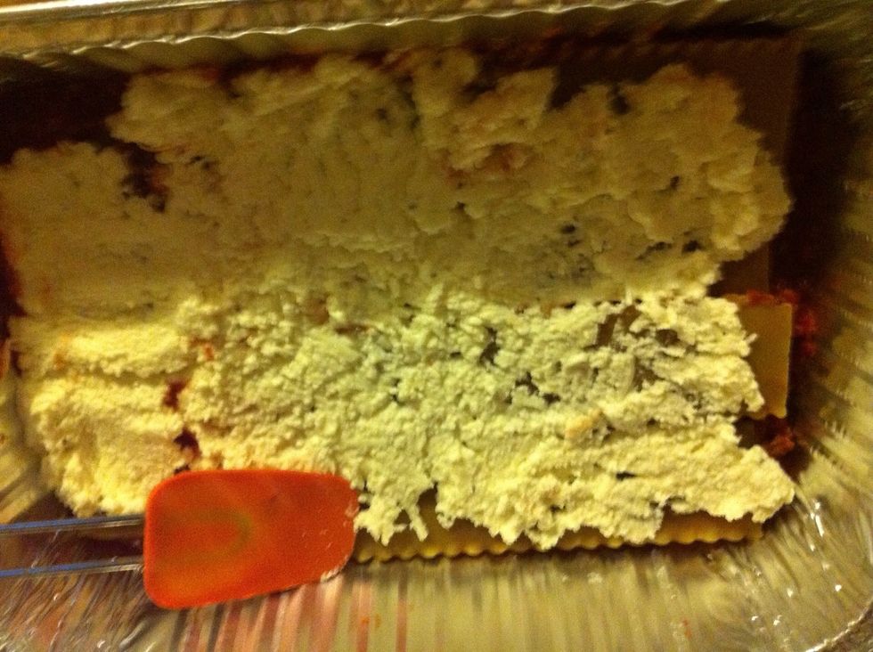 Add a layer of the cheese mixture and than sauce. Keep doing this until you have reached your desired height. I think for the pan I cooked tonight it is 3 layers.