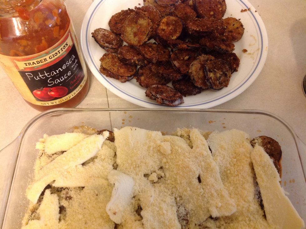 Add a layer of the mozzarella cheese (I just sliced the mozzarella, I think next go around I would shred it for easier distribution) and sprinkle with a 1/2 cup of Parmesan cheese.