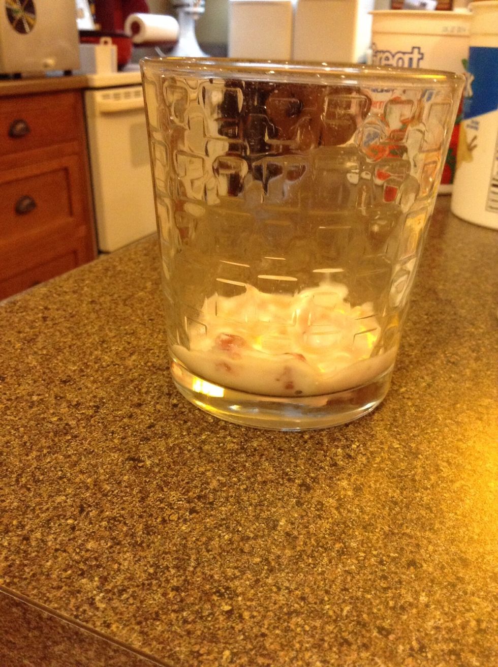 Add a layer of yogurt to cup