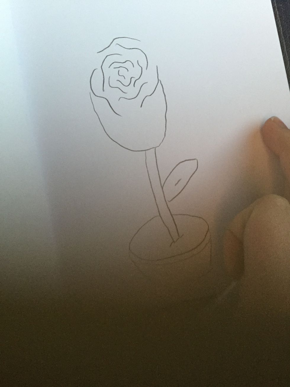 Add a leave or two and a pot of dirt for your lovely rose