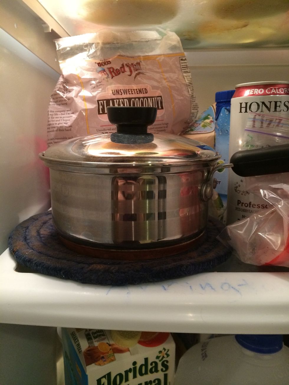 Add a lid to catch excess steam and place in the fridge. (Sorry for the messy fridge.) let cool until it is at least room temperature