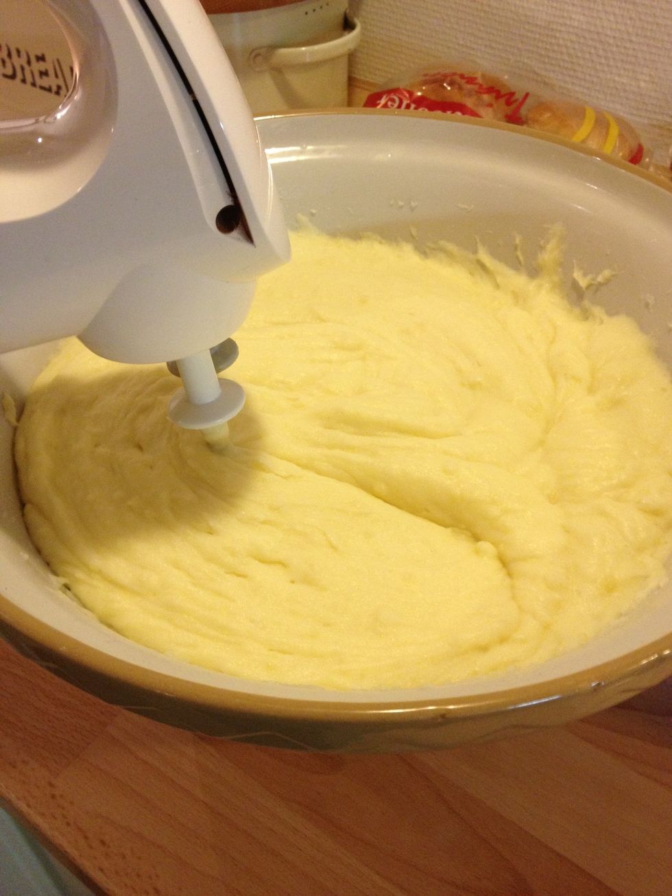 Add a liter milk, and 100g of butter.. And whip until that smooth potato mash consistency :)