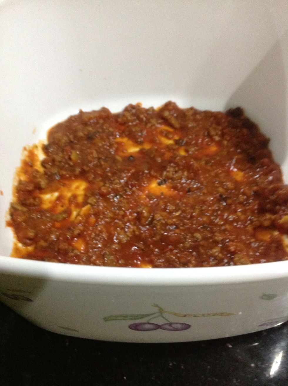 Add a little bit of sauce on the bottom of dish and add the first layer of lasagna. I forgot to snap a picture...