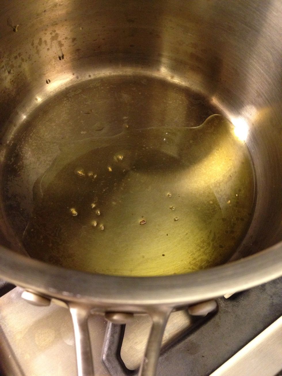 Add a little bit of the olive oil into a pot.