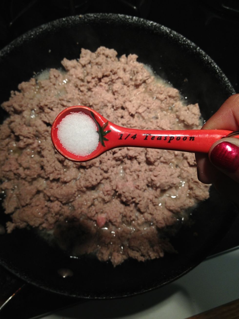 Add a little less than 1/4 teaspoon of salt to the meat
