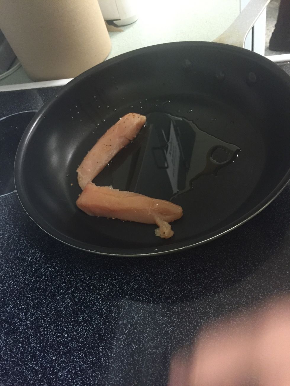 Add a little oil in the pan and add the chicken