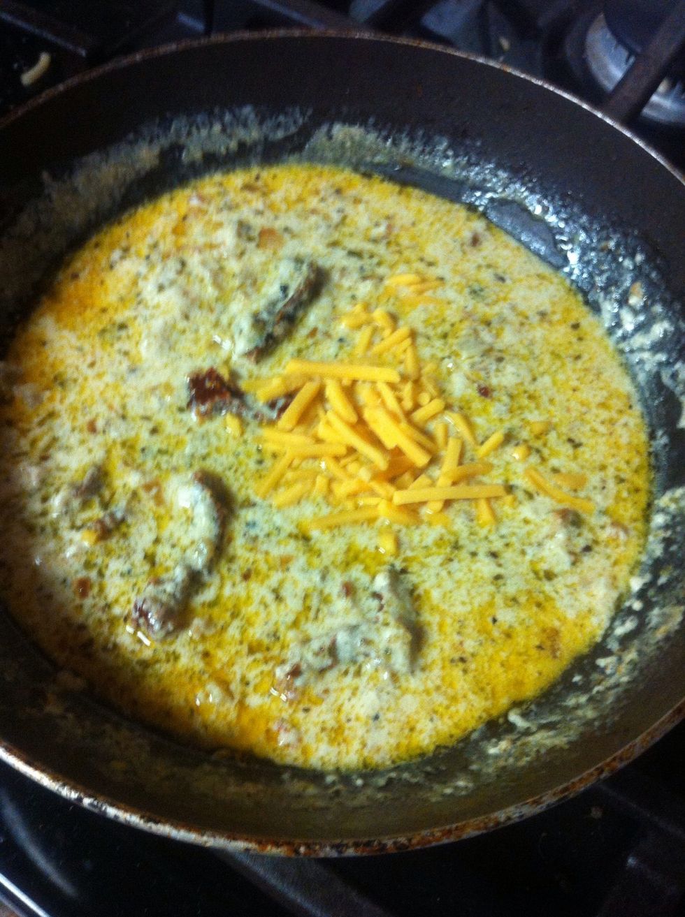 Add a little sharp cheddar cheese