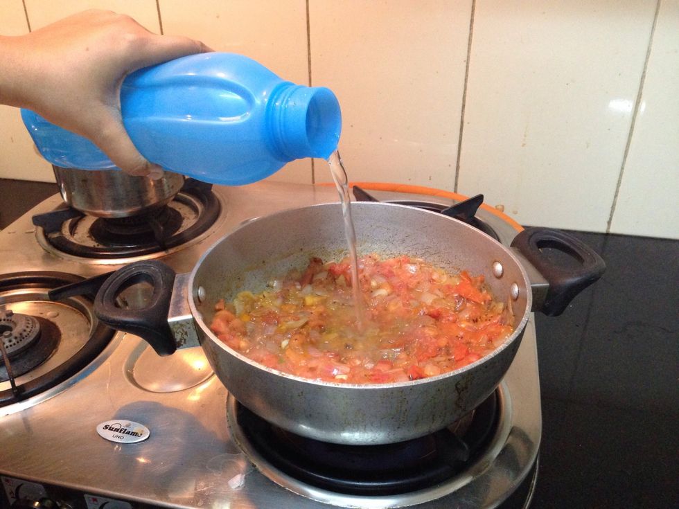 Add a little water and mix it up. Make sure to keep stirring to avoid it getting burnt at the bottom.